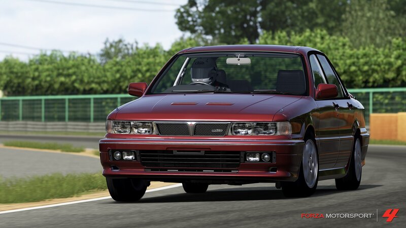 Red Sedan on Track