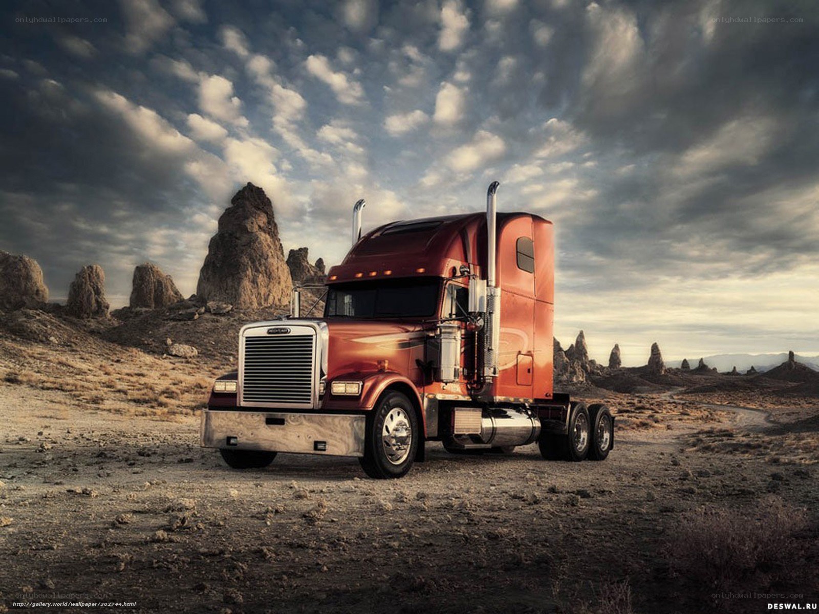 Red semi-truck in desert landscape