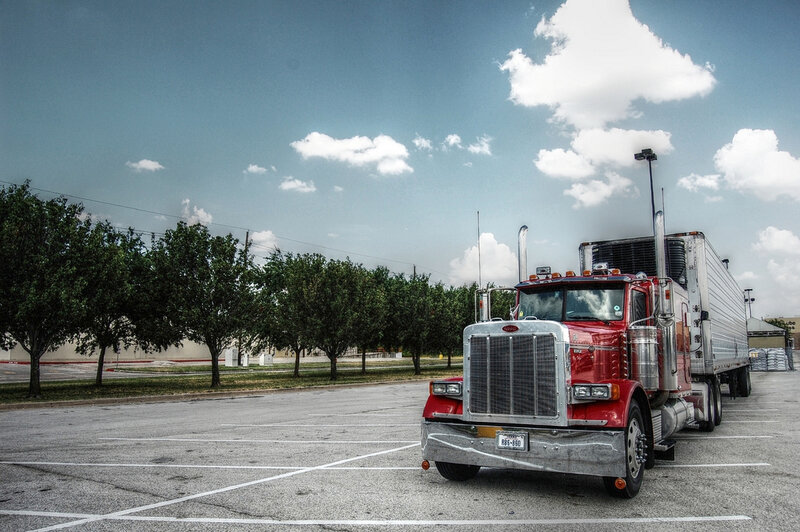 Red Semi-truck in Parking Lot
