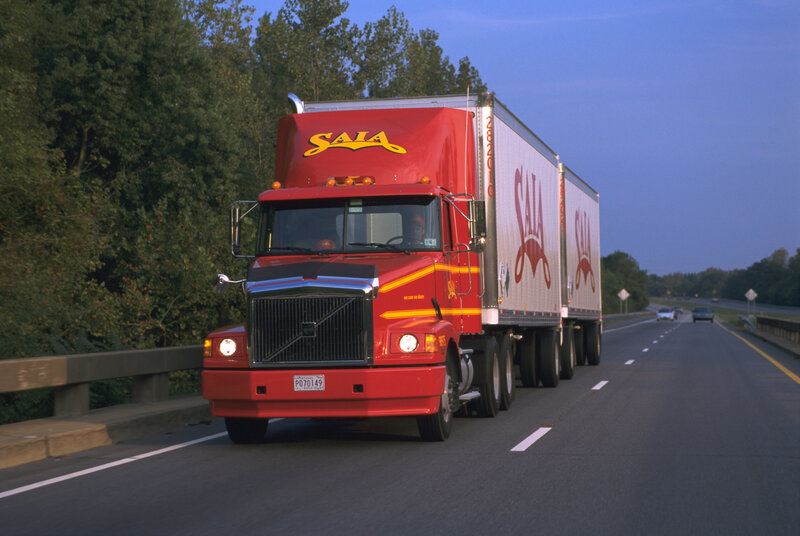 Red semi-truck on highway