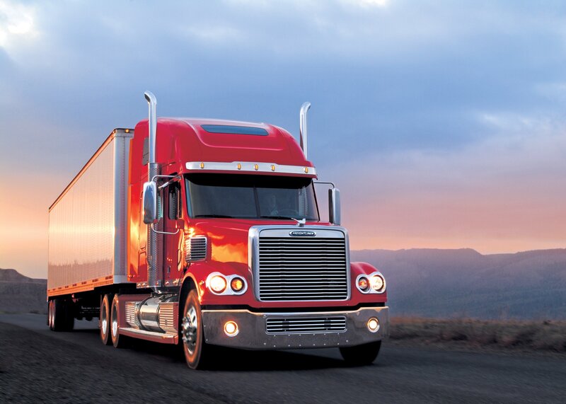 red semi-truck on highway