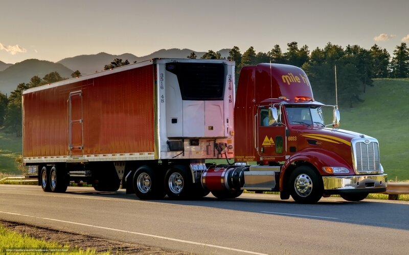Red semi-truck on highway