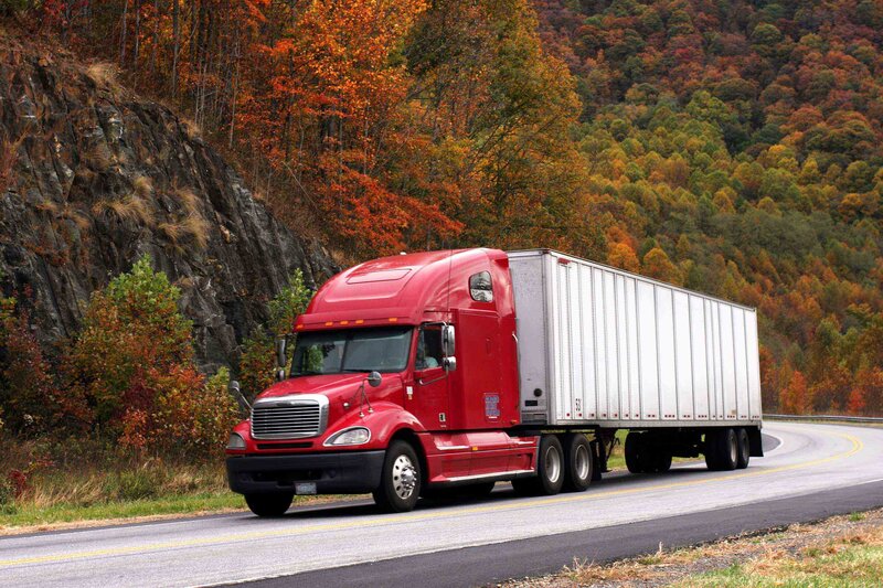 Red Semi-truck on Road — Calm, Autumn