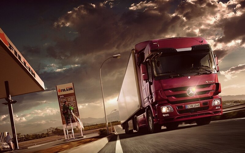 Red Semi-truck on Road — Dramatic, Sunset