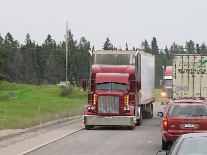 Red Semi-truck on Road — Overcast