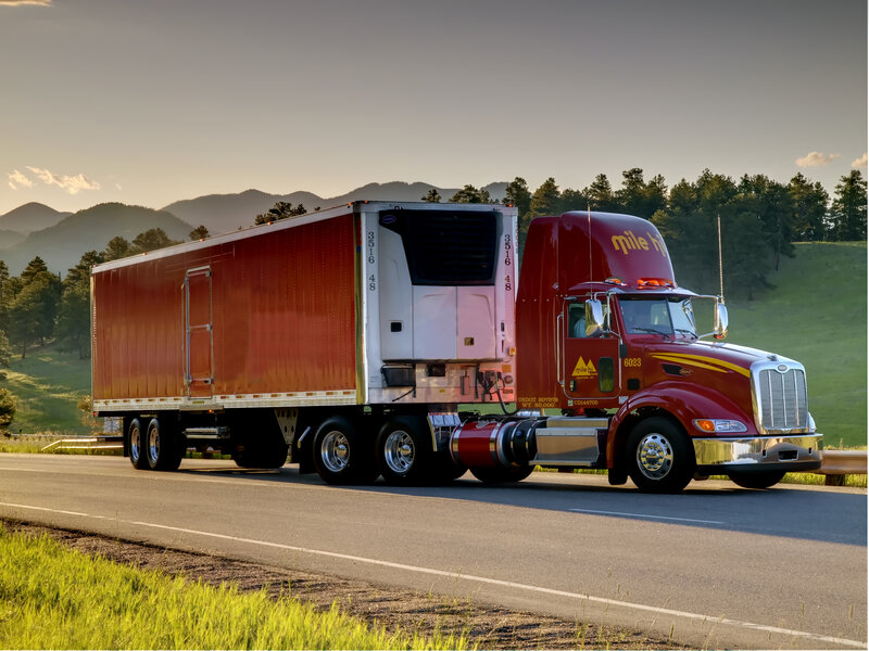 Red Semi-truck on Road — Serene, Sunset