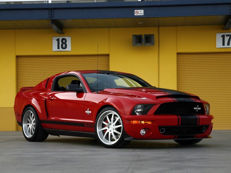 Red Shelby GT500 in garage