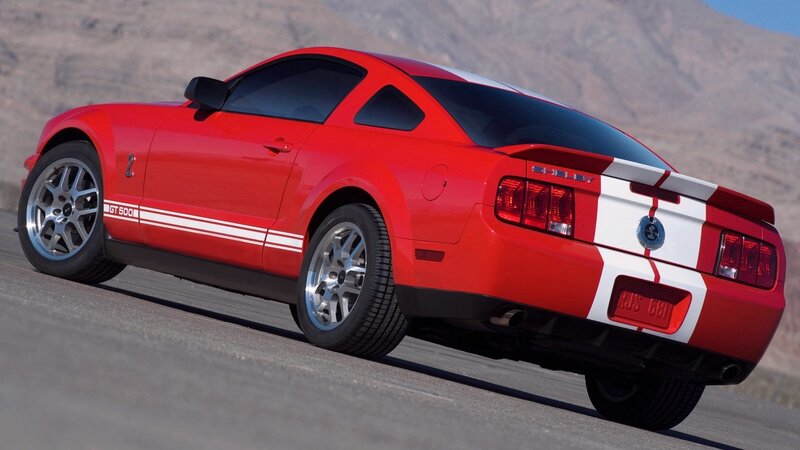 Red Shelby GT500 on desert road