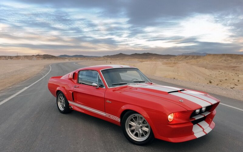 Red Shelby GT500 on desert road