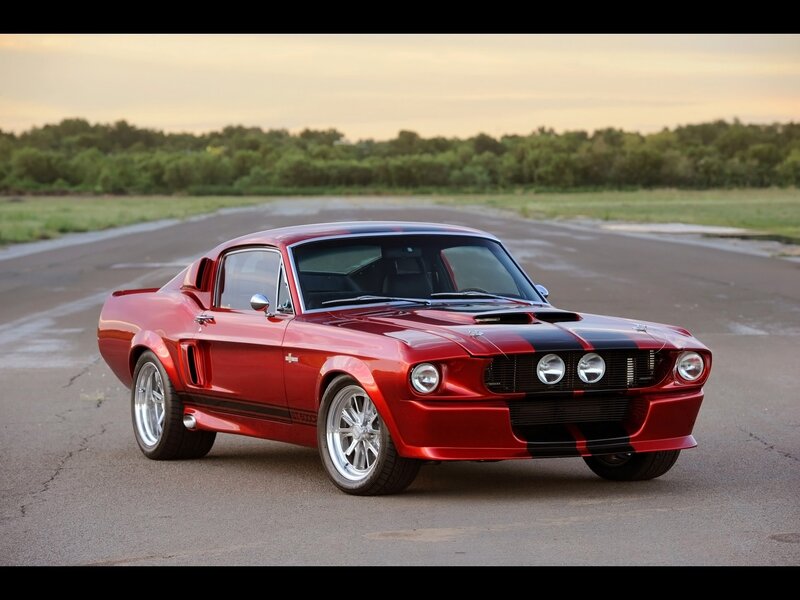 Red Shelby Mustang on track