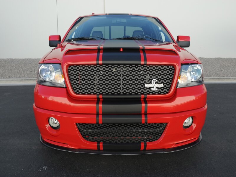red shelby truck with stripes