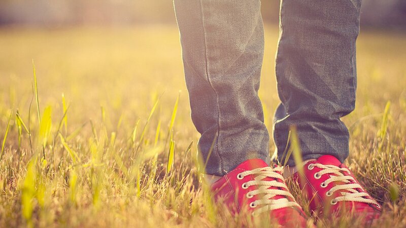 red shoes on grass