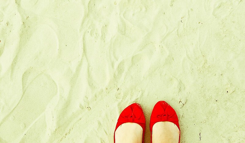 Red Shoes on Sand — Calm