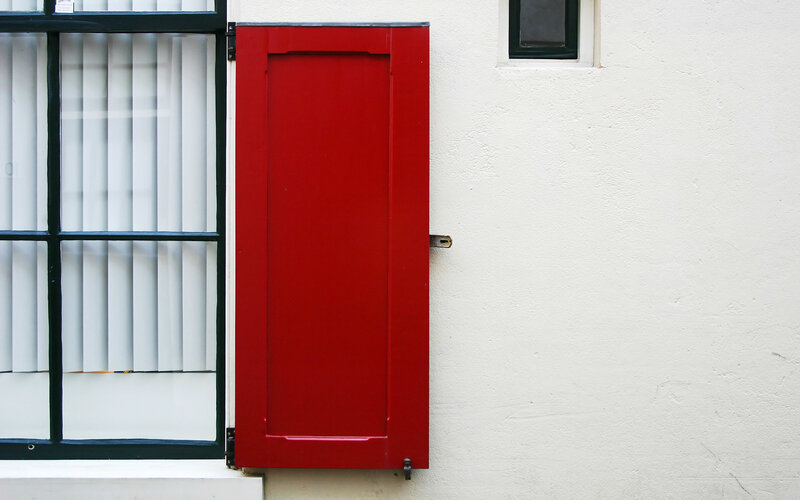 Red Shutter on Wall
