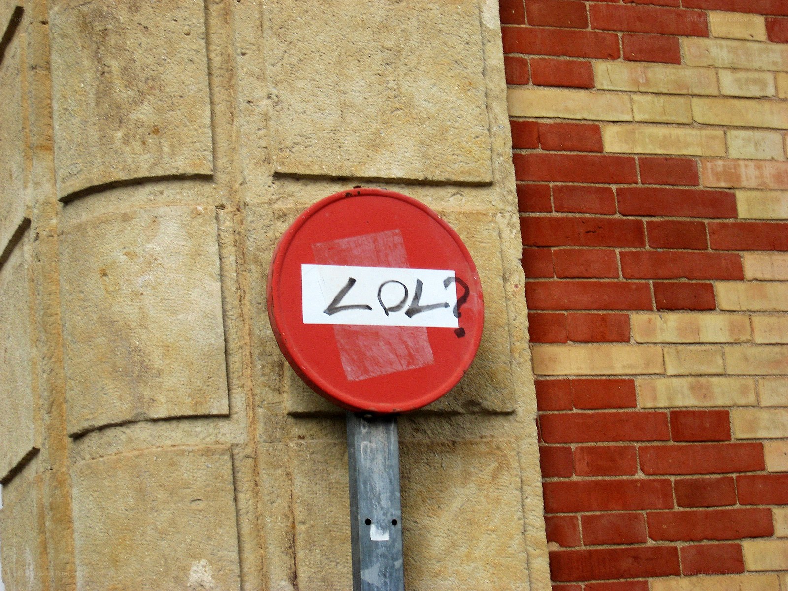 red sign with lol graffiti