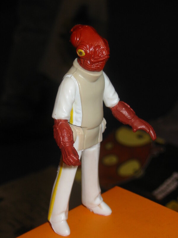 red-skinned action figure