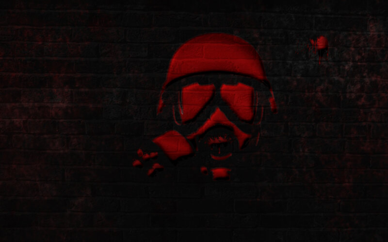red skull graffiti on brick wall