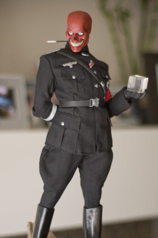 Red-skulled Figure in Uniform