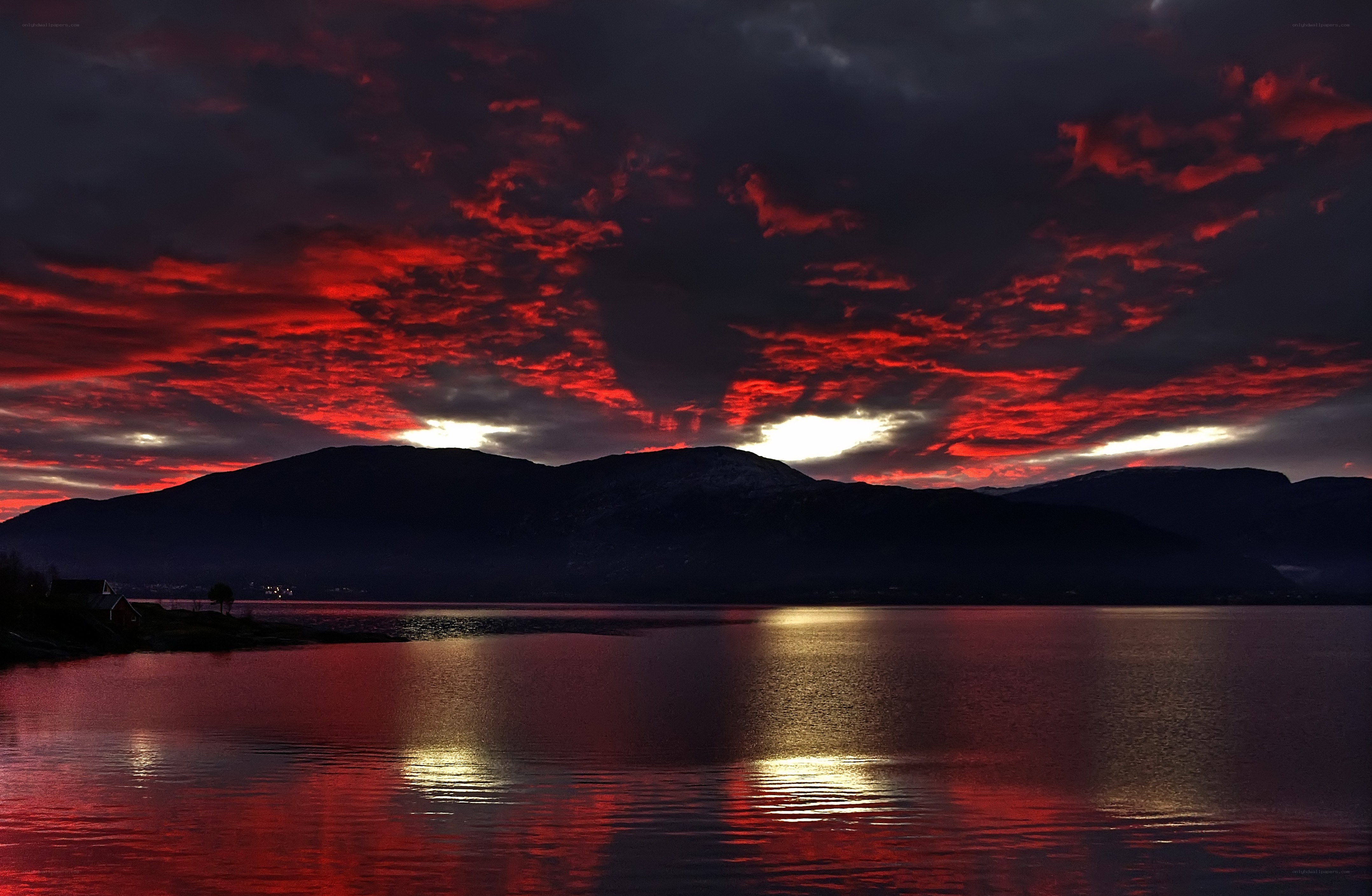 Red sky over a fjord