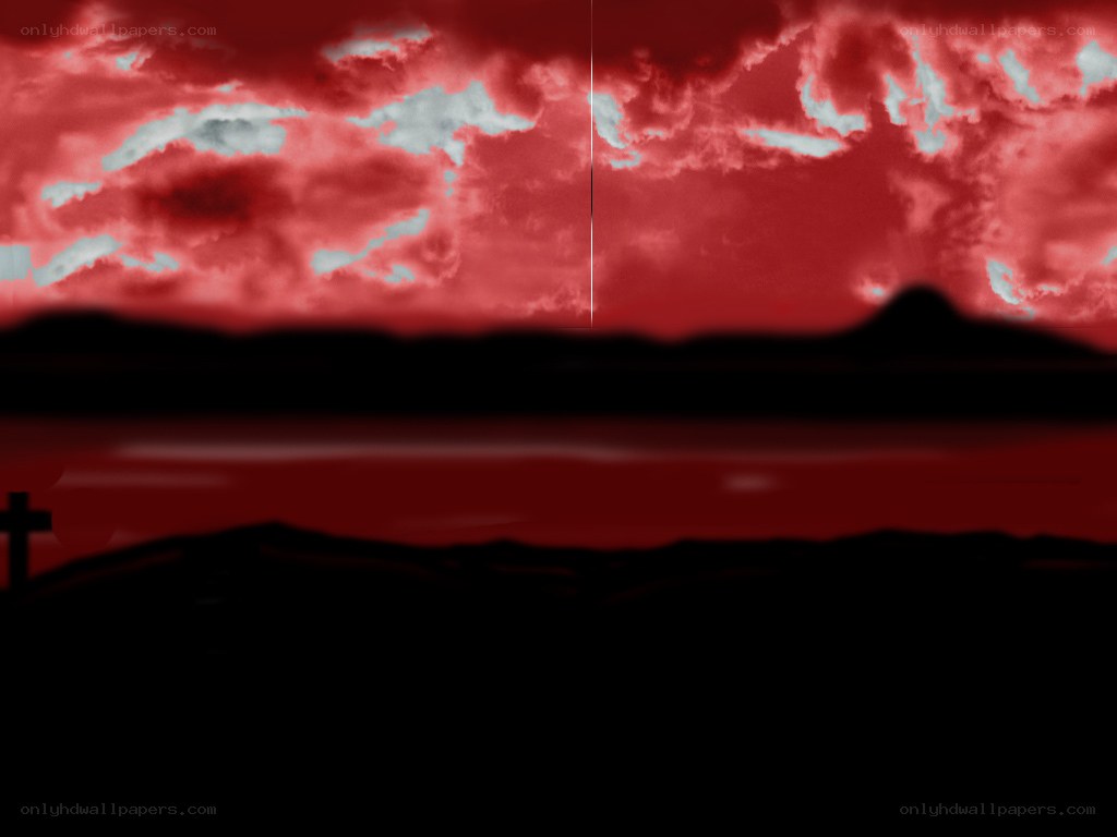 red sky over dark landscape