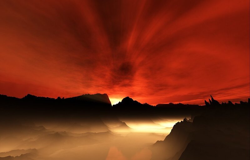 Red sky over mountain range