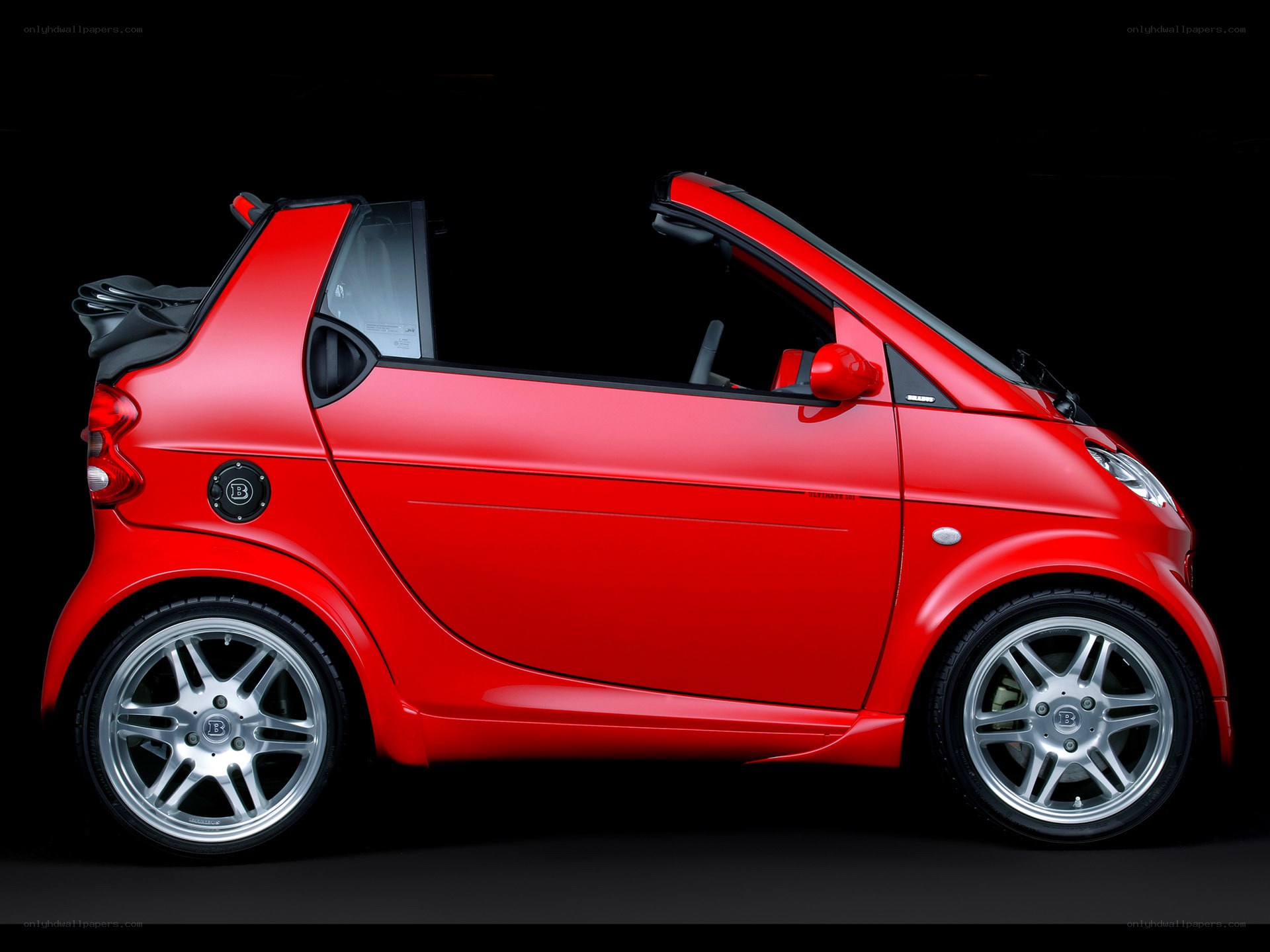 Red smart car convertible