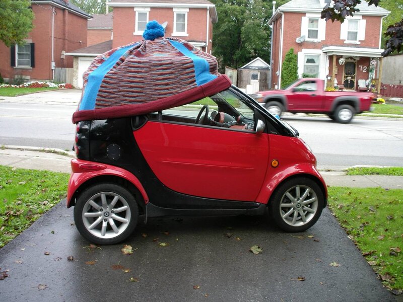 Red Smart Car with Hat