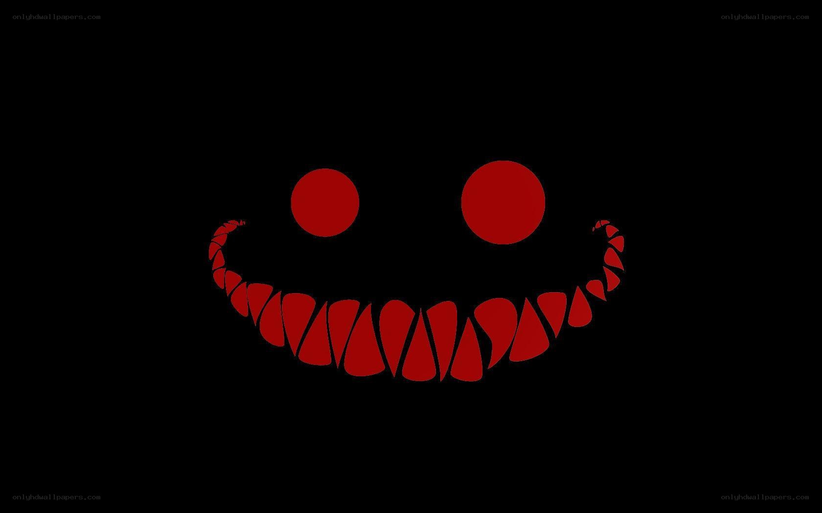 red smiley face on black
