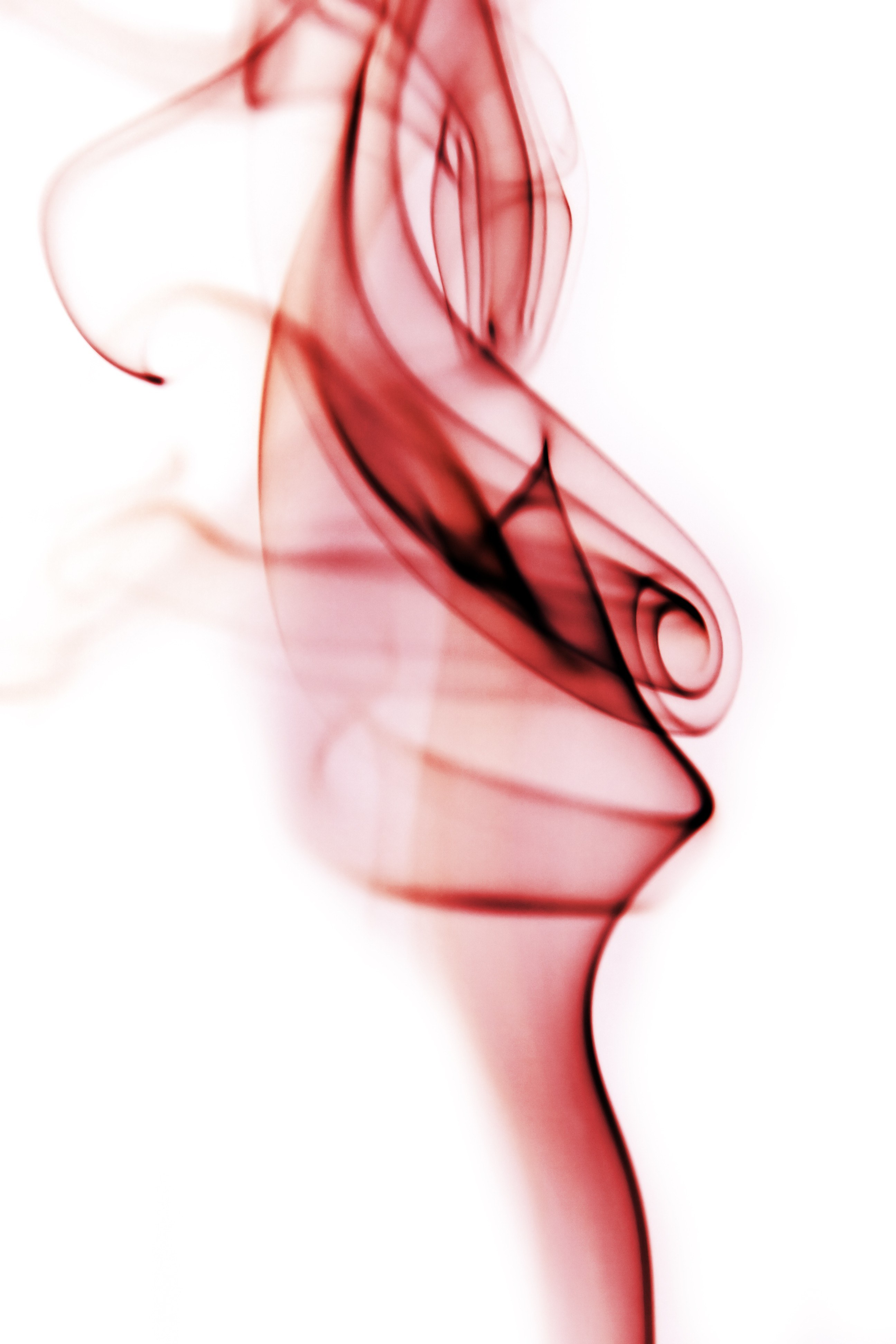 Red smoke swirls