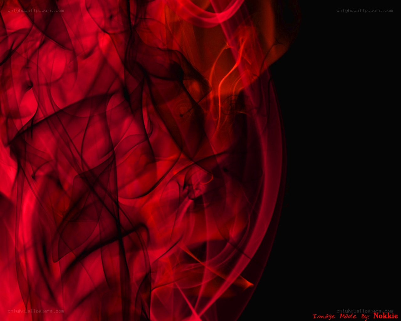Red smoke swirls on black