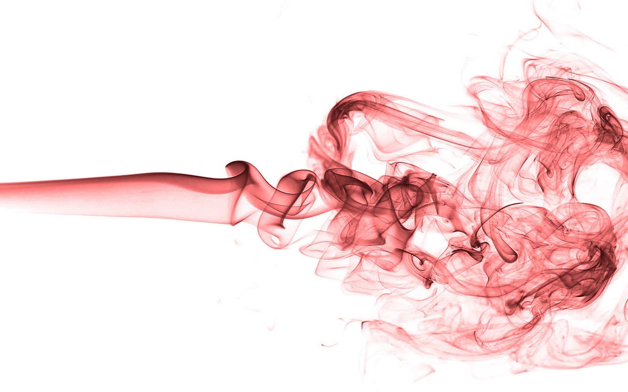 red smoke swirls on white
