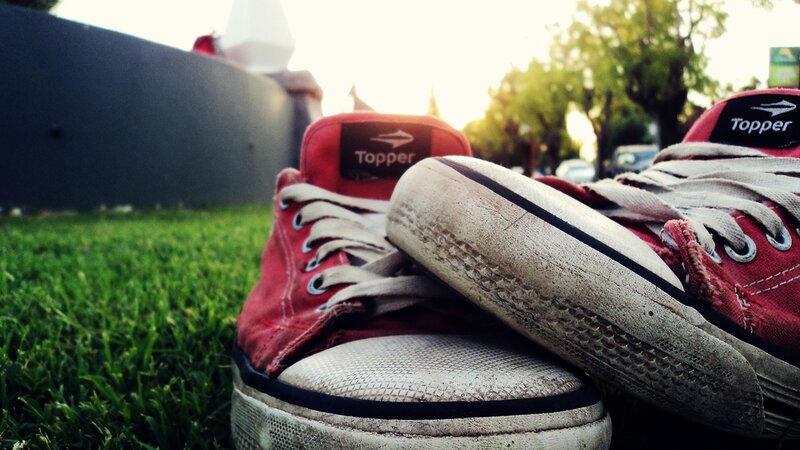 Red Sneakers on Grass — Calm