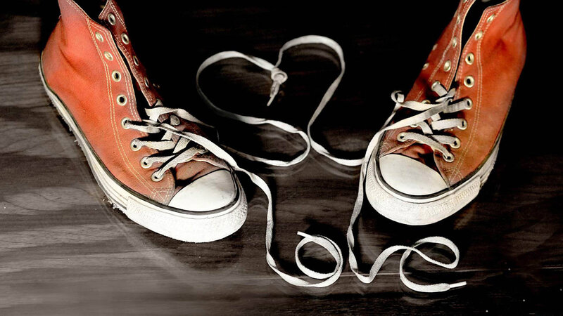 Red Sneakers on Wood