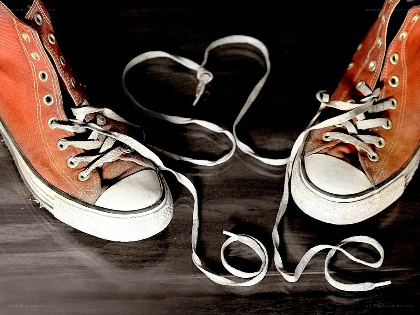 Red sneakers with heart laces