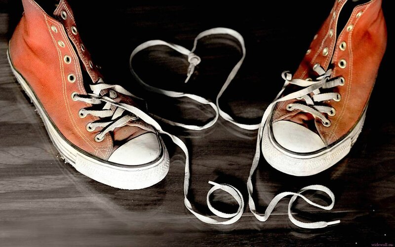 Red sneakers with heart-shaped laces