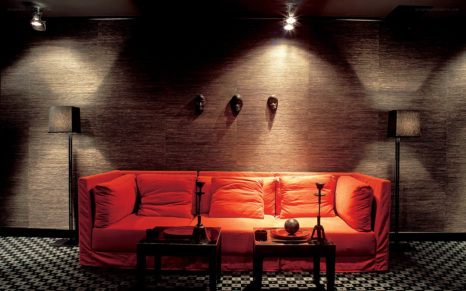 Red sofa in dimly lit room