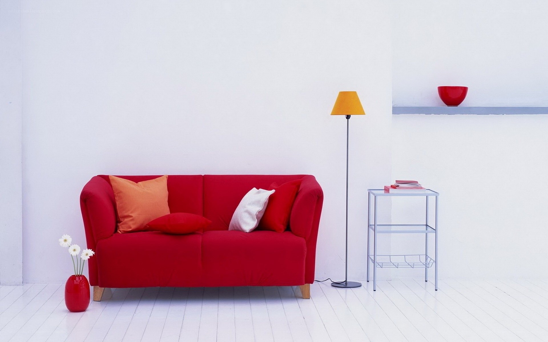 Red sofa in minimalist room