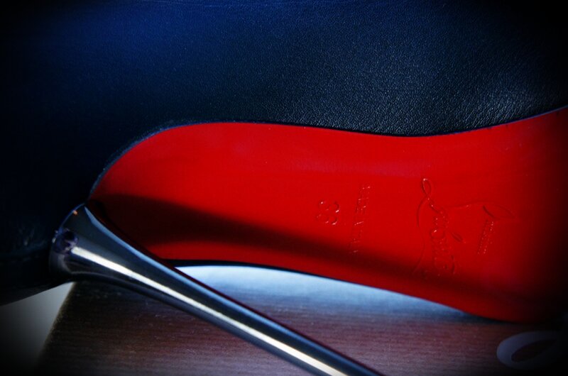 Red-soled Shoe