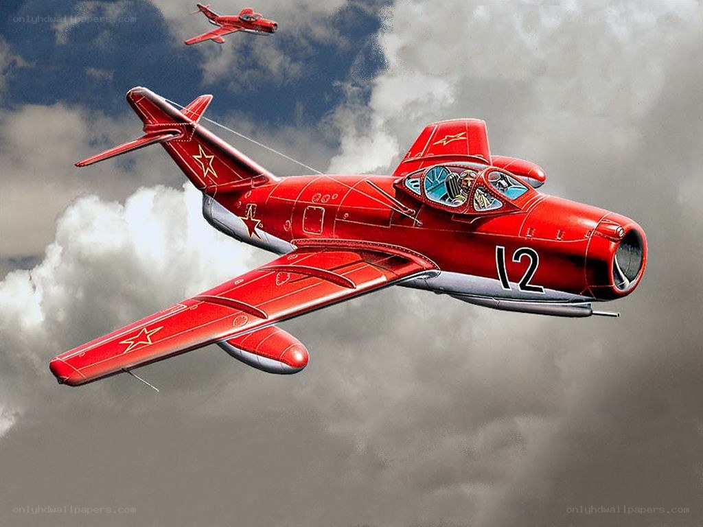 Red Soviet jet fighters in flight