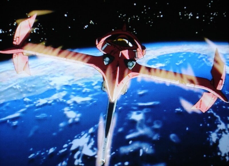Red spacecraft over Earth