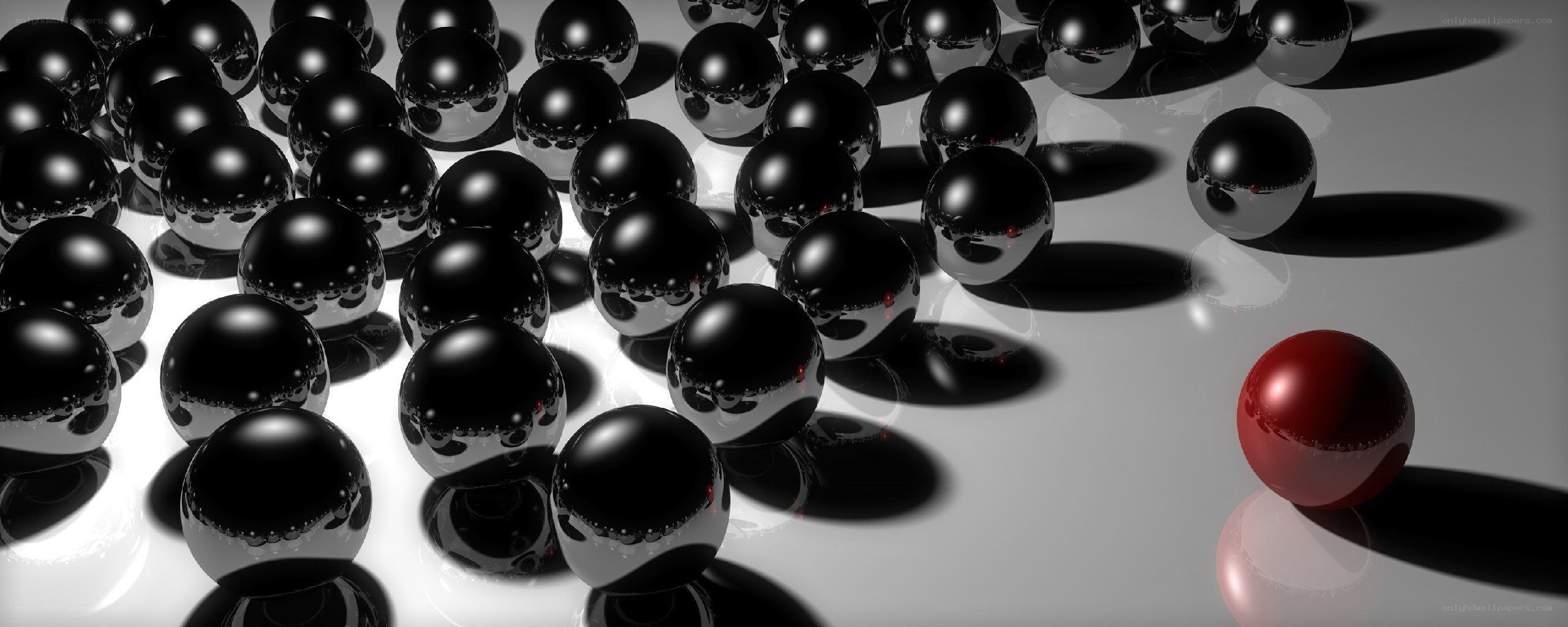 red sphere among black spheres