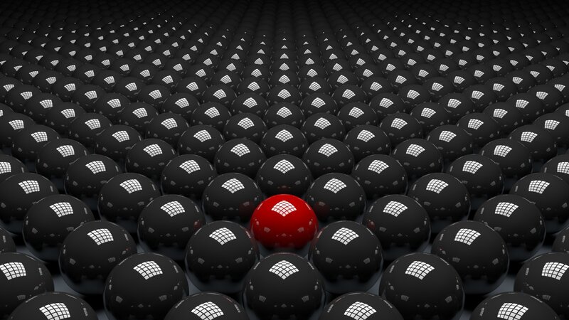 Red Sphere Among Black Spheres — Abstract