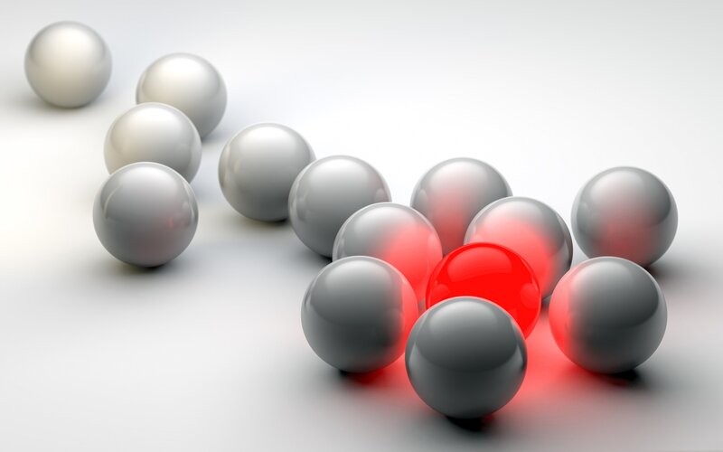 Red Sphere Among Gray Spheres