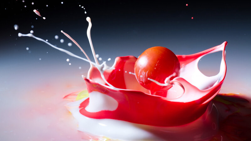 Red Sphere in Liquid Splash — Dramatic