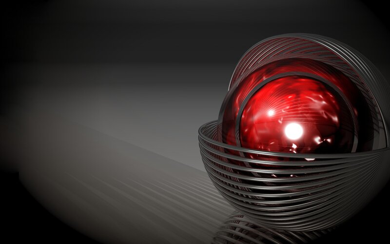 Red Sphere in Metal Cage — Dramatic