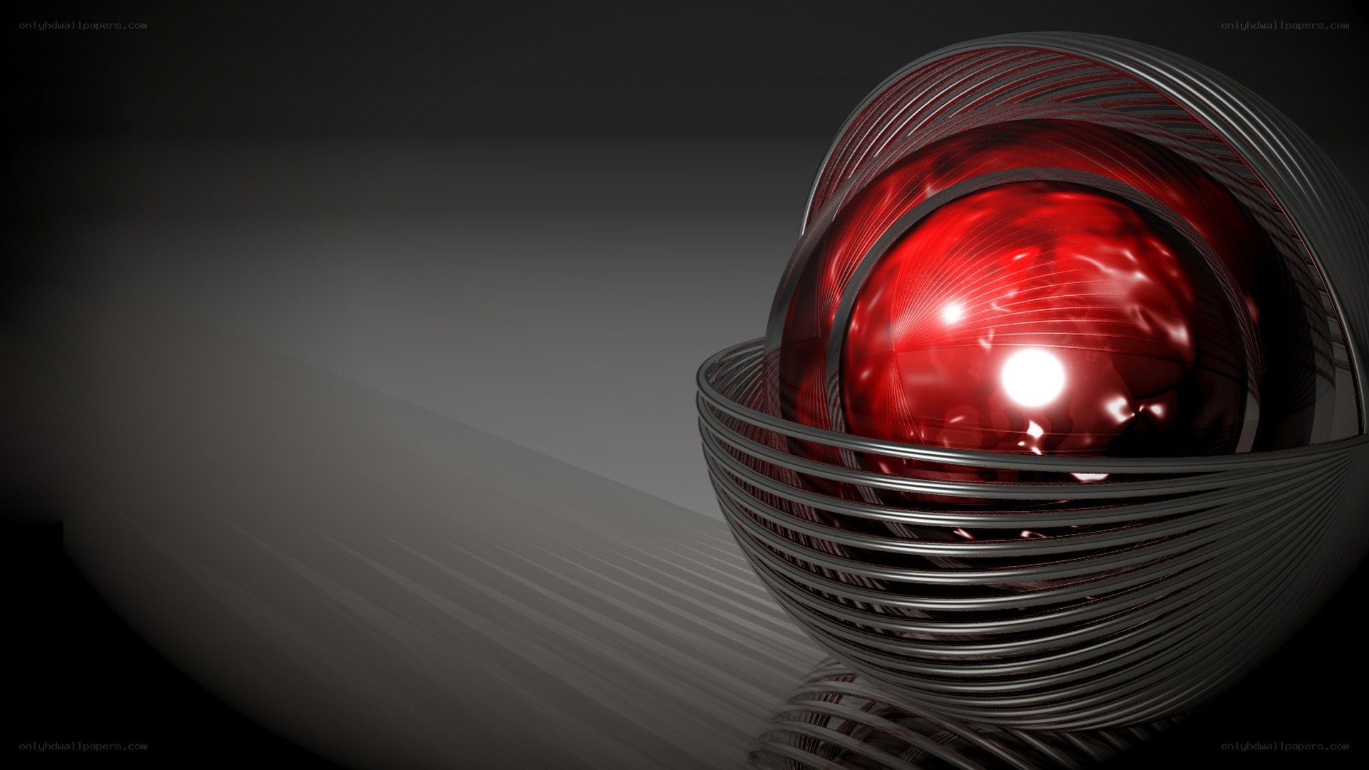Red sphere in metallic cage