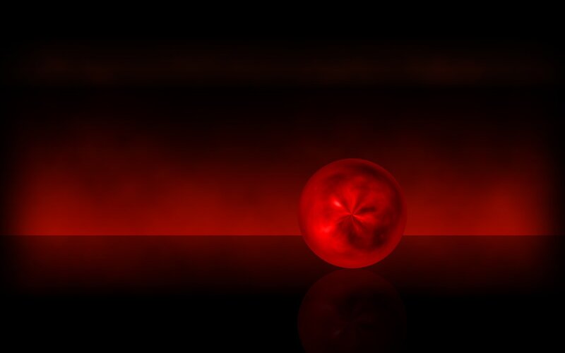 Red sphere on dark background