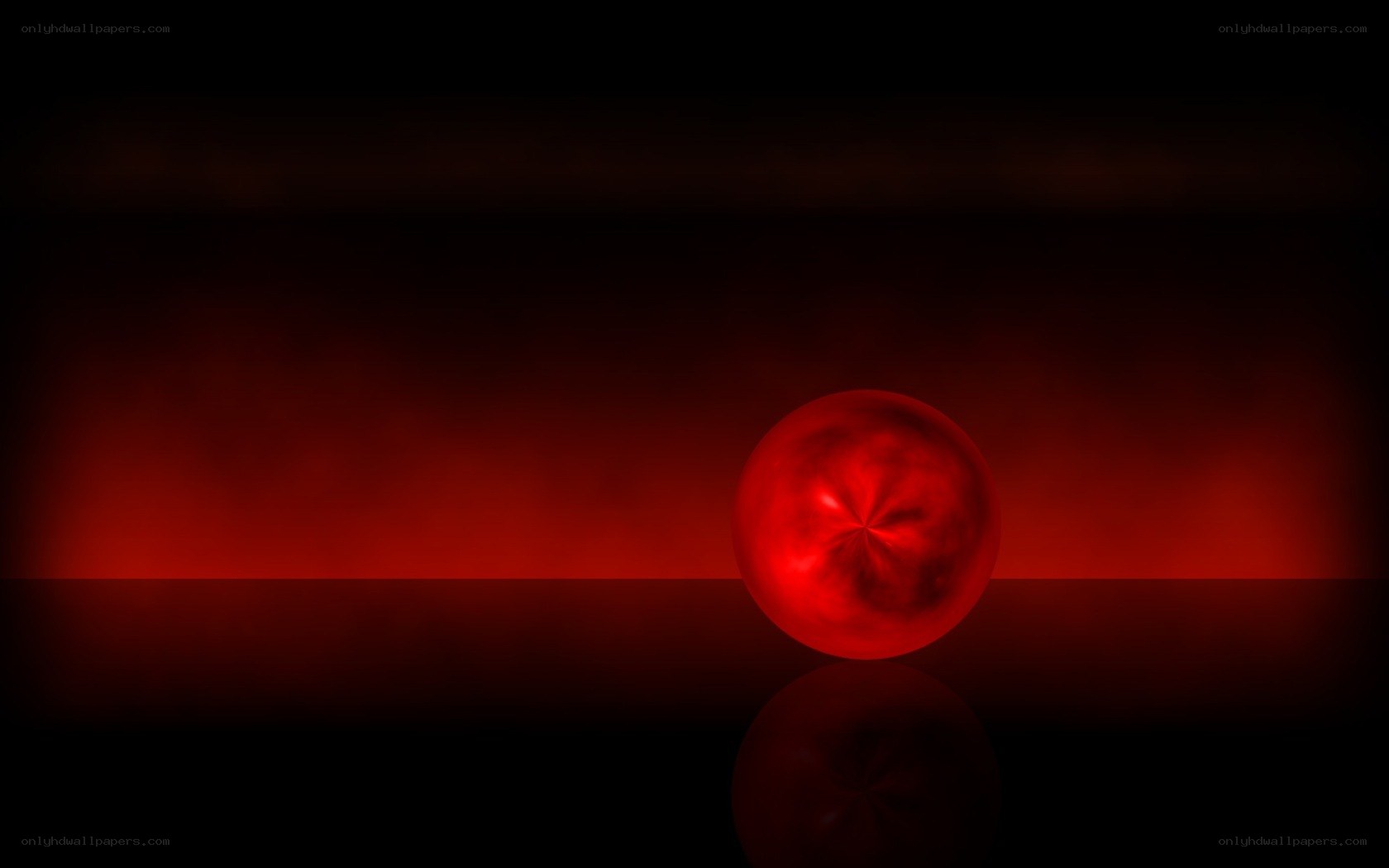 Red sphere on dark background