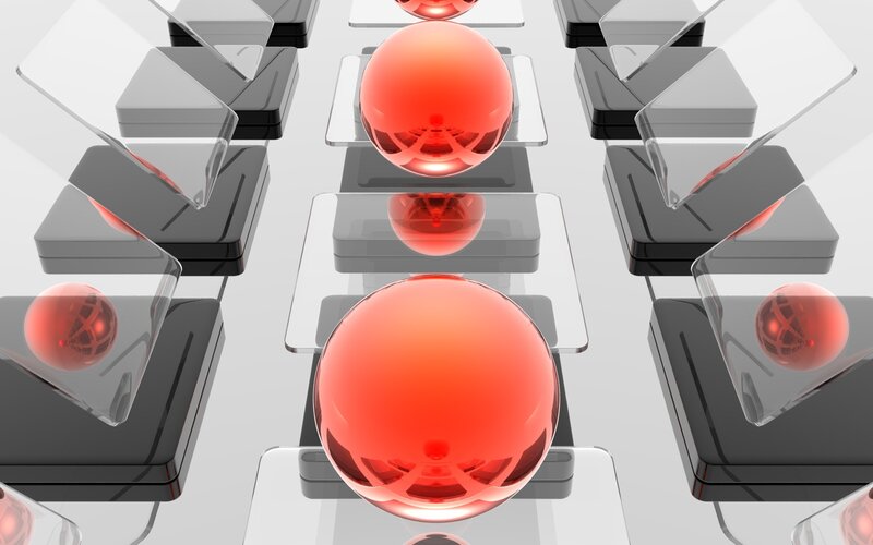 Red spheres on geometric platform