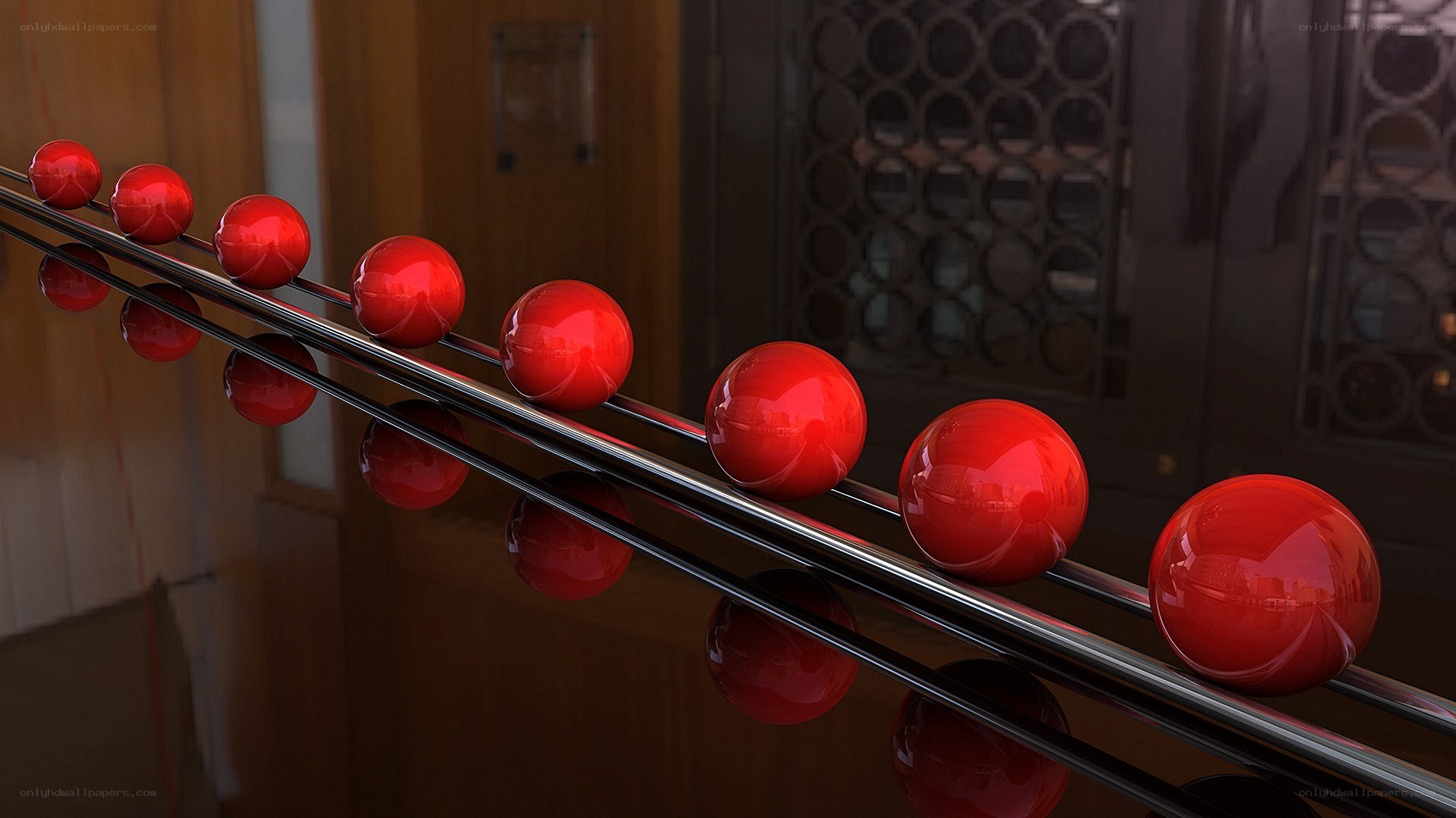 Red spheres on metal rails